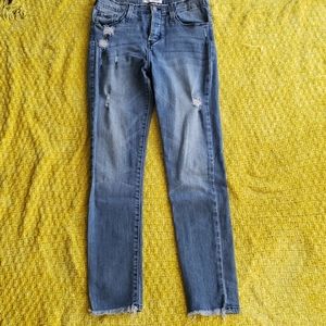 Medium wash destroyed skinny jean
